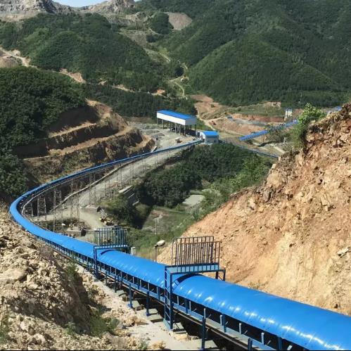Curved belt conveyor