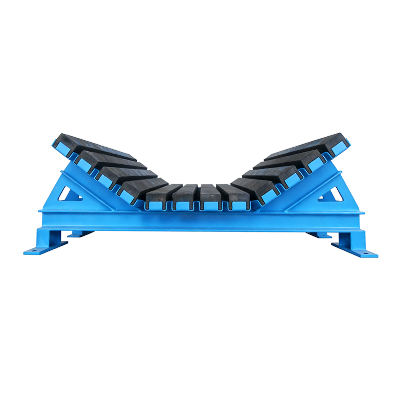 Cross-section of buffer bed showing support beam spacing and vulcanized bonding between UHMWPE wear layer and rubber base